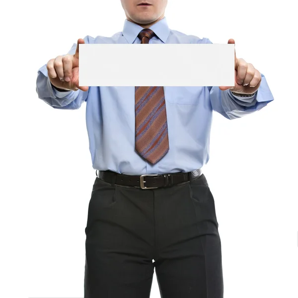 Uomo d'affari in camicia blu tiene cartello bianco — Foto Stock