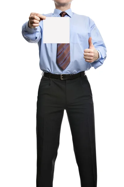 Empresário mostrando polegar para cima e segurando ou apresentando um branco — Fotografia de Stock