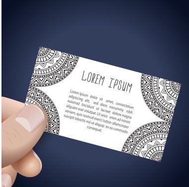 Kartvizit etnik tarzda eliyle.