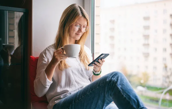 Young Woman Long Red Hair Glasses White Shirt Sitting Windowsill — Stock Photo, Image