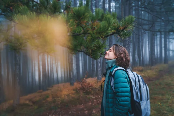 Young Happy Woman Traveler Green Jacket Backpack Foggy Pine Forest — Stock Photo, Image