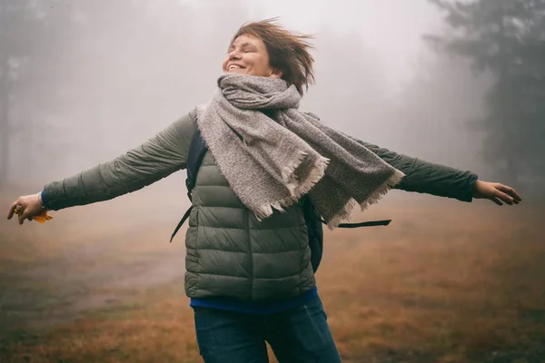 Young Happy Woman Traveler Green Jacket Backpack Foggy Pine Forest — Stock Photo, Image