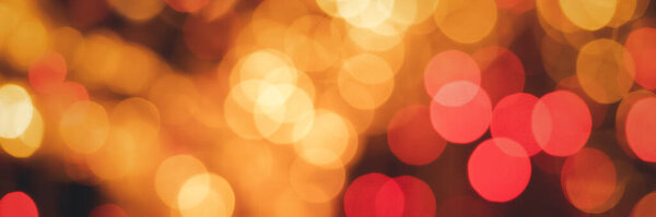 Golden red shining orange bokeh blurred festive background and texture