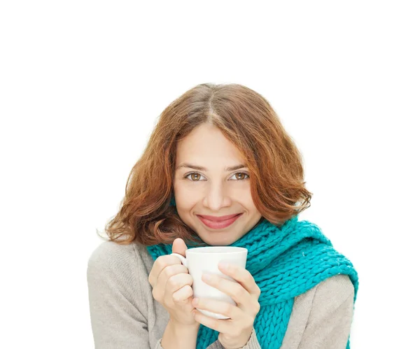 Young woman in blue scarf with white mug isolated on white backg — Stock Photo, Image