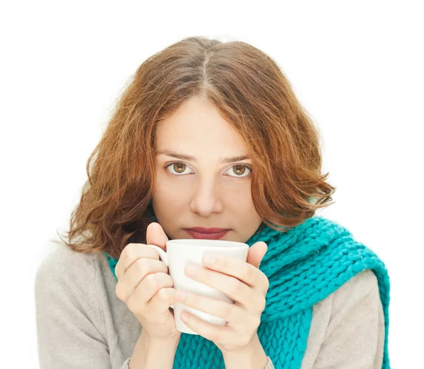 Young woman in blue scarf with white mug isolated on white backg — Stock Photo, Image