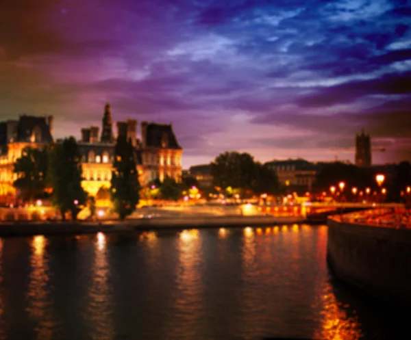 Fora de foco brilhando fundo da cidade de Paris, França — Fotografia de Stock