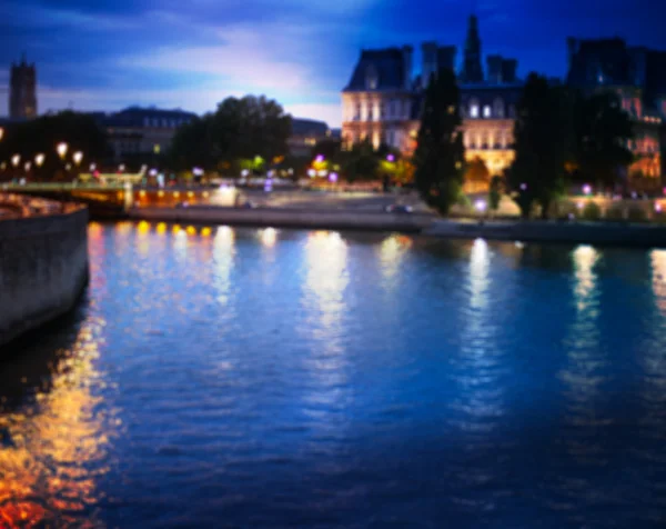 Fora de foco brilhando fundo da cidade de Paris, França — Fotografia de Stock