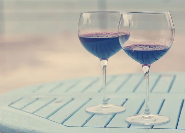 Two glasses with red wine on a table outdoor cafe — Stock Photo, Image