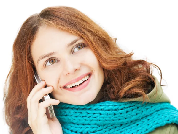 Beautiful young woman talking on a mobile phone — Stock Photo, Image