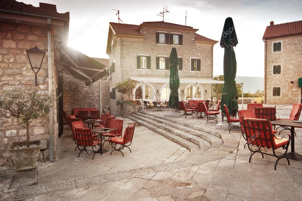 empty street cafe on the square of a European city