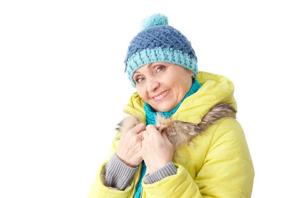 Smiling woman of 50 years in the bright winter clothes isolated — Stock Photo, Image