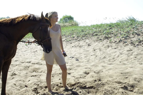 Blond rider on the horse — Stock Photo, Image