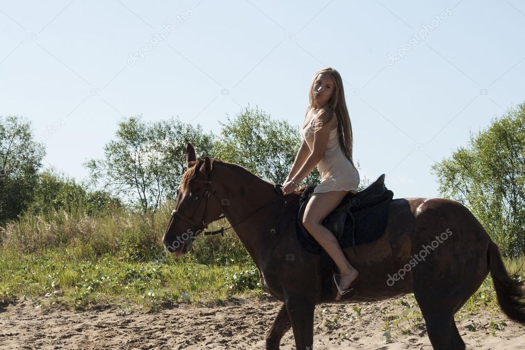 blond rider on the horse