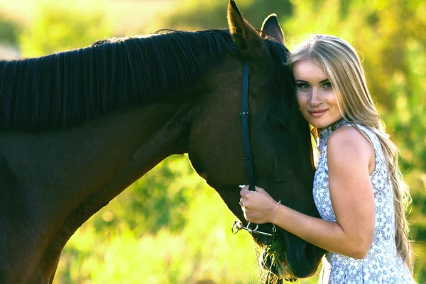 Blond rider on the horse — Stock Photo, Image