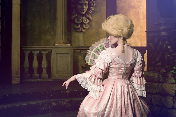 Victorian lady posing in vintage interior — Stock Photo, Image