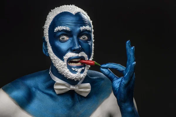 Man   eating chili pepper — Stock Photo, Image