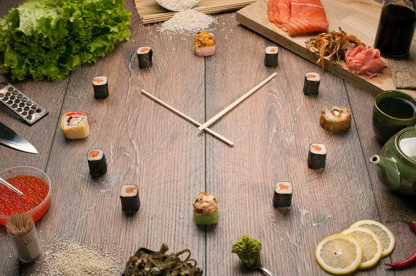 Sushi time in the form of a wall clock — Stock Photo, Image