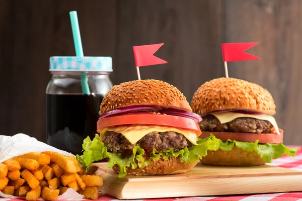 Tasty burgers with flags — Stock Photo, Image