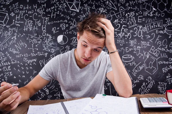 Hipster student doing his homework — Stock Photo, Image