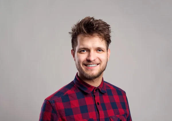 Hipster man in checked shirt — Stock Photo, Image