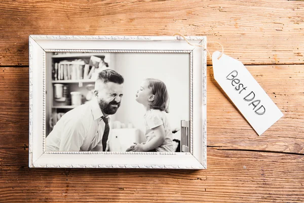 Fathers day composition. Picture frame. Wooden background. — Stock Photo, Image