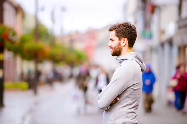 Young man runner in town — Stock Photo, Image
