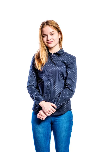 Girl in jeans and shirt, young woman, studio shot — Stock Photo, Image