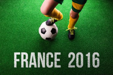 Fransa 2016 işareti ile küçük futbolcu