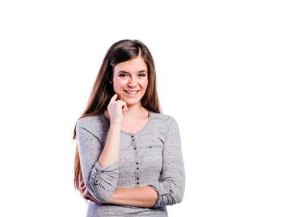 Mädchen in grauem Langarm-T-Shirt junge Frau, Studioaufnahme — Stockfoto