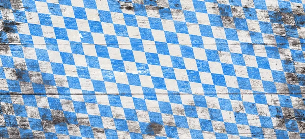 Oktoberfest pozadí s modrými a bílými rhombus vzor — Stock fotografie