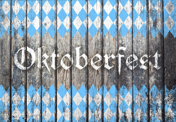 Oktoberfest pozadí s modrými a bílými rhombus vzor — Stock fotografie