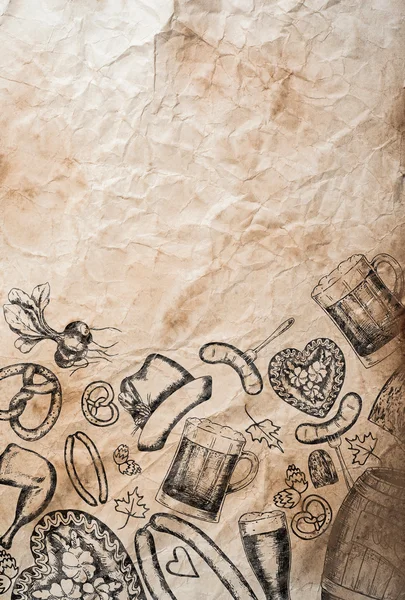 Hand drawn Octoberfest symbols on old rumpled paper background — Stock Photo, Image