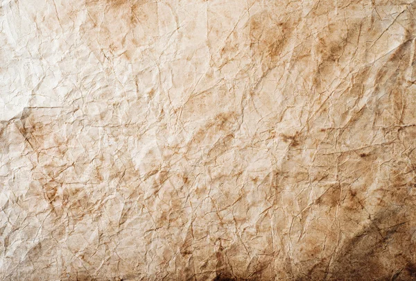 Piece of old rumpled stained paper as background — Stock Photo, Image