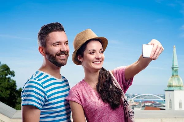 Couple with smartphone, taking selfie — Stock Photo, Image