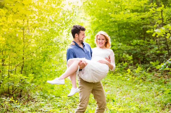 Wedding couple in green forest. — Stock Photo, Image