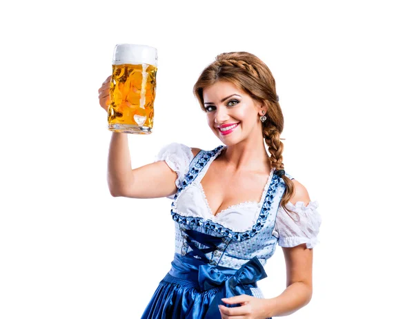 Žena v bavorské šaty s pivem — Stock fotografie