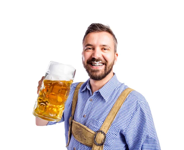 Hombre en ropa bavariana con cerveza — Foto de Stock