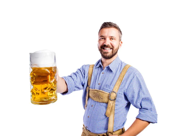 Man in bavarian clothes with beer — Stock Photo, Image