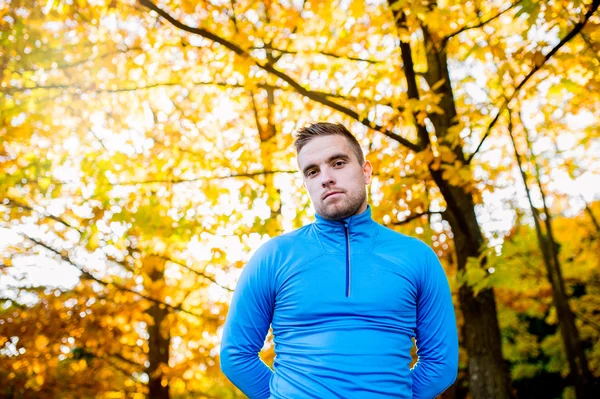 Young  man  runner in autumn nature — Stock Photo, Image