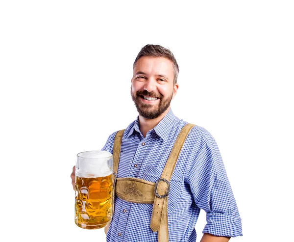 Man in bavarian clothes with beer — Stock Photo, Image