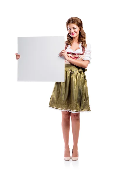 Woman in bavarian dress, studio shot, copy space — Stock fotografie