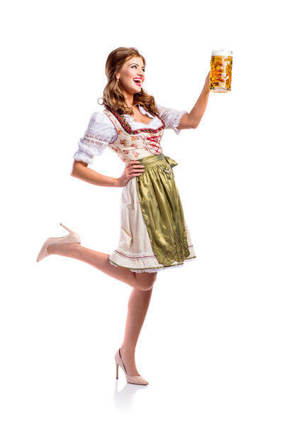 Woman in traditional bavarian dress holding beer