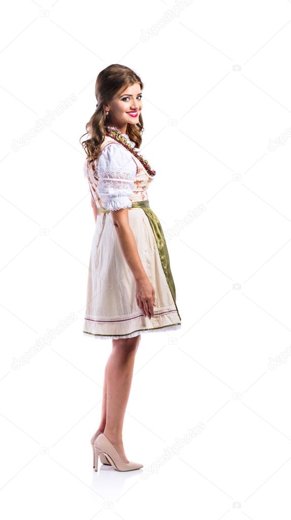Beautiful woman in traditional bavarian dress, studio shot, isol
