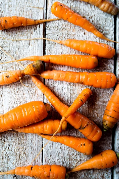 Fresh carrots on table