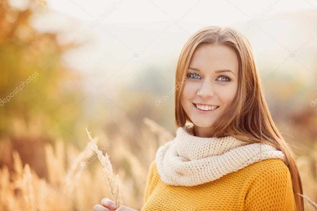 Girl with scarf in autumn