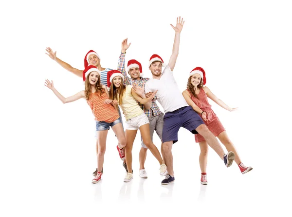 Gruppo di studenti in cappelli natalizi — Foto Stock