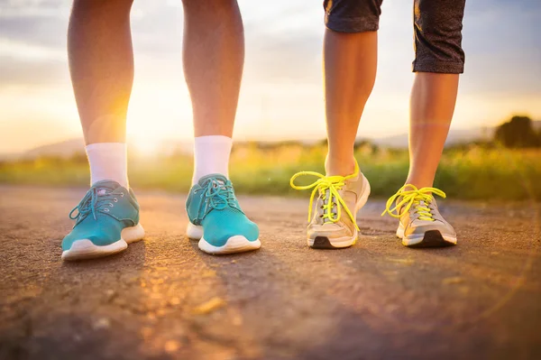 Cross-country trail running people at sunset — Stock Photo, Image