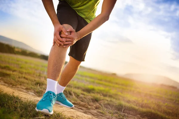 Muscle pain during running training — Stock Photo, Image