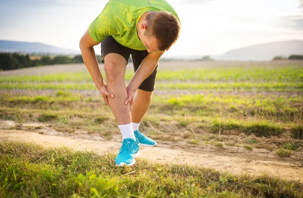 Runner's leg and muscle pain — Stock Photo, Image