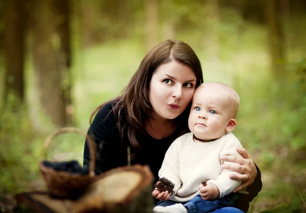 Mother with baby son in forest — Stock Image Mother with baby son in forest Stock Picture
